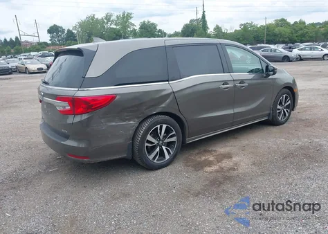 2018 Honda Odyssey Elite z USA, uszkodzony, nr VIN 5FNRL6H97JB025422